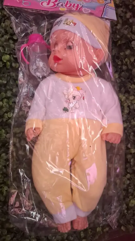 MUÑECA CON MUSICA