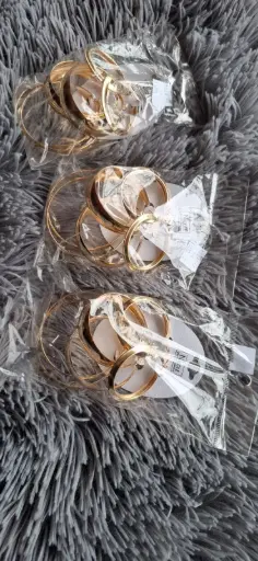 ARGOLLAS METALICAS DORADAS